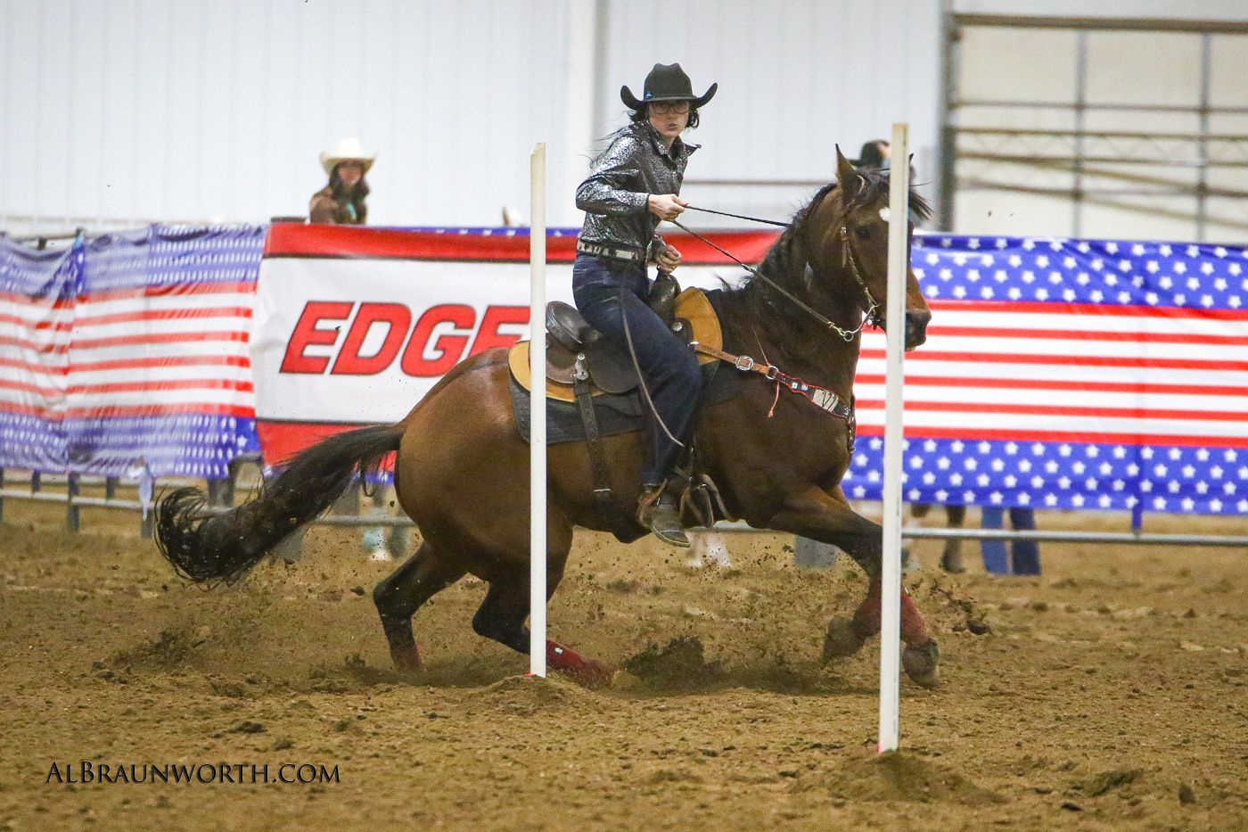 Grey horse turning the first pole